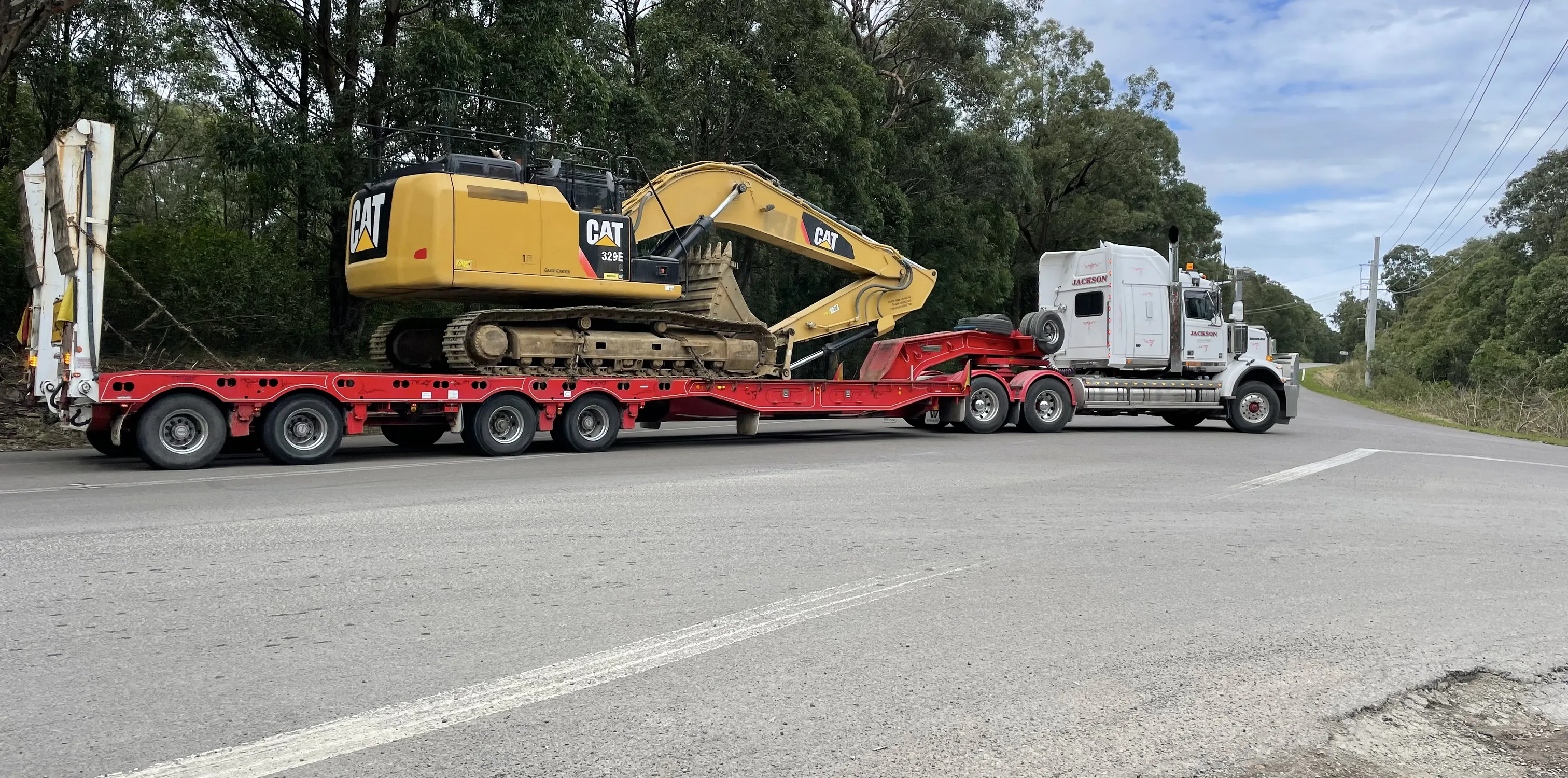 Alliance Excavations excavator on float transport