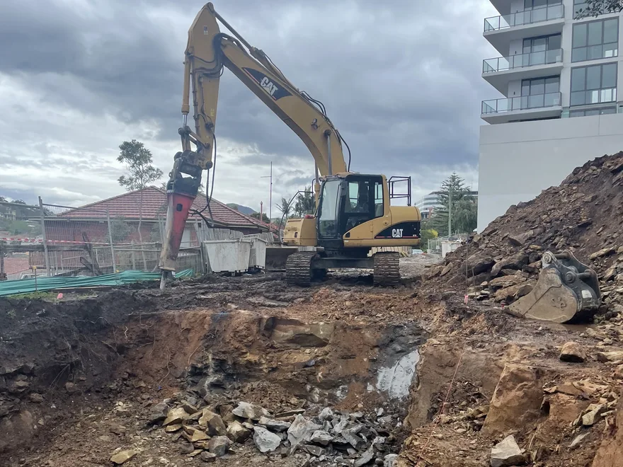 Rock breaking on a confined commercial site