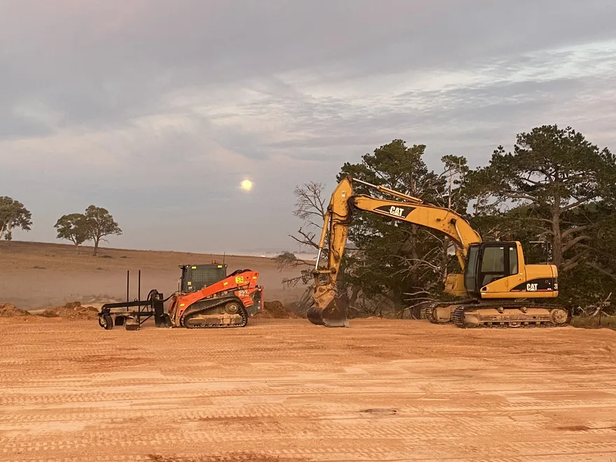 Pad cut and levelled with machines on site